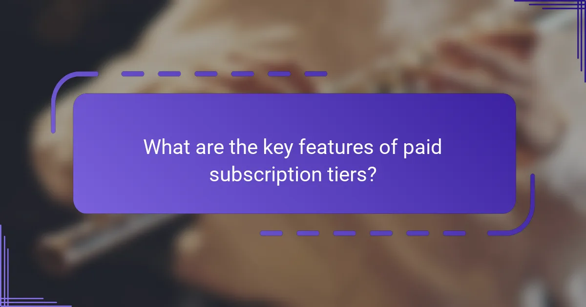 What are the key features of paid subscription tiers?